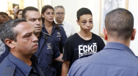 Tariq Abu Khdeir (2nd R), 15-year-old Palestinian-American and cousin to Mohammed Abu-Khdeir, who was abducted and burned alive by Israeli settlers on Wednesday. (Reuters)