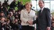 Hollande and Merkel vow to seek growth for Europe