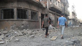 Syrian troops kill more than 150 in Hama, activists say