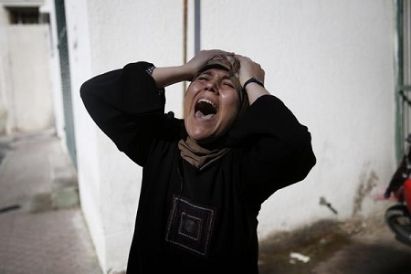 Woman who lost her family (image by Amnesty International)