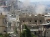 Smoke billows in the Ain al-Helweh Palestinian refugee camp near Sidon, Lebanon, on August 23, 2015. (AFP/Mahmoud Zayyat/File)